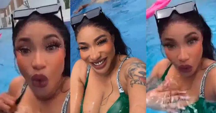WATCH: Moment Tonto Dikeh exposed her nip while swimming in bikini (Video)