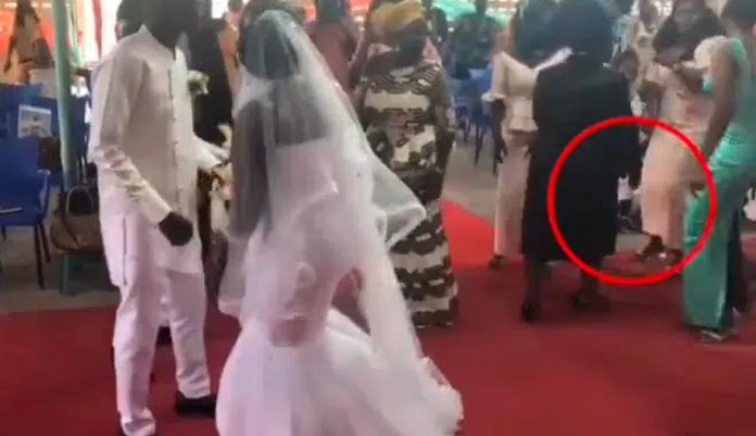 WATCH: Moment Pastor’s wife spanked bridesmaid for dancing ‘inappropriately’ at wedding