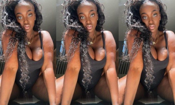 Pretty African lady with brown skin showing off her fresh b00bs on Instagram
