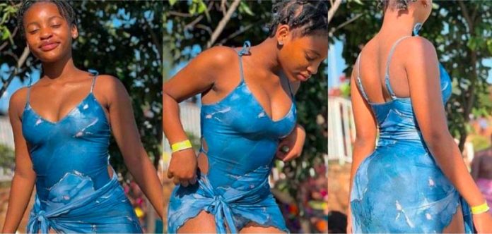 Young beautiful lady opens her goodies online as she rocks a blue b!kini (Photos)